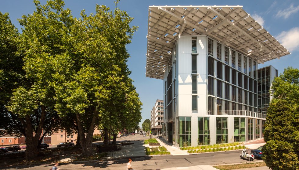 The Bullitt Center (Seattle) is a sustainable smart building using solar panels, rainwater harvesting, and energy-efficient automation.